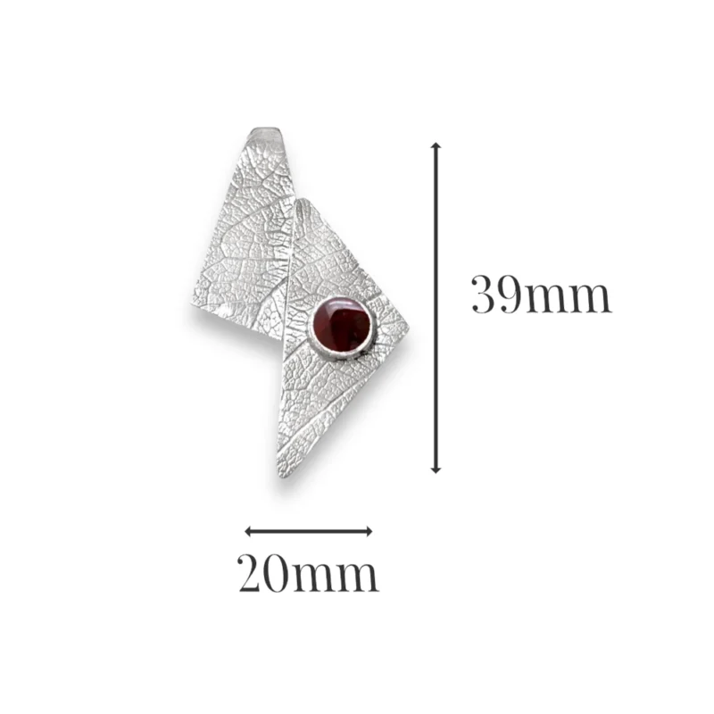 Sterling silver and Garnet pendant featuring the leaf texture